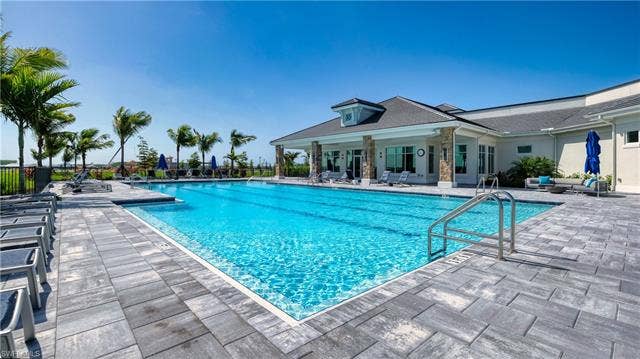 18500 Wildblue Blvd, Fort Myers, FL 33928 Community pool featuring a patio area