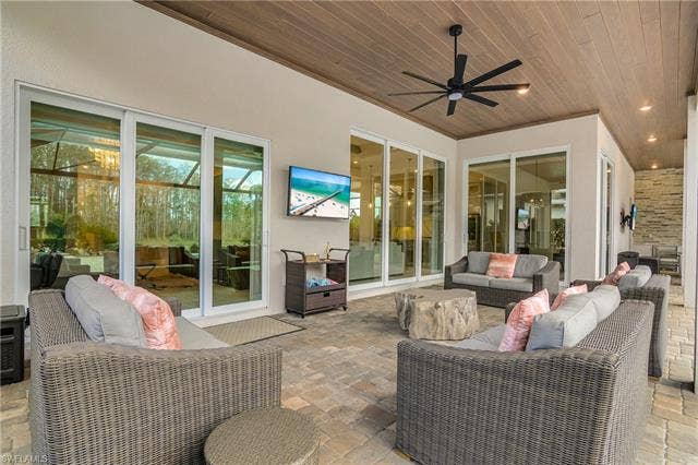 18500 Wildblue Blvd, Fort Myers, FL 33928 View of patio featuring an outdoor hangout area and ceiling fan