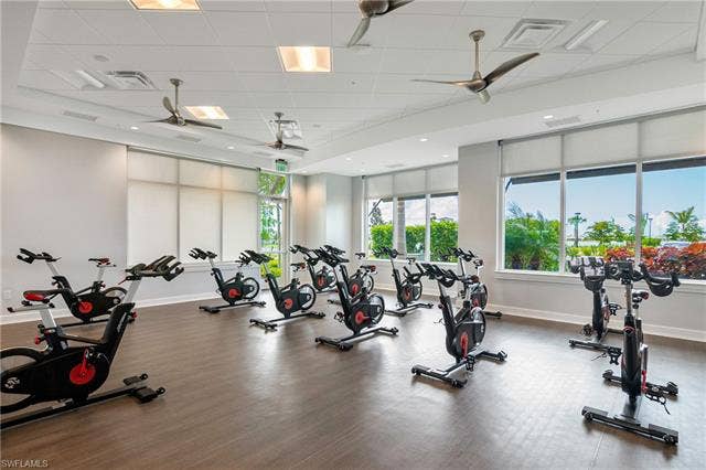 18500 Wildblue Blvd, Fort Myers, FL 33928 Workout area with a paneled ceiling and a ceiling fan