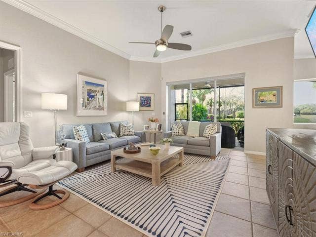 10000 Isola Way, Miromar Lakes, FL 33913 Great Room looking to lanai.