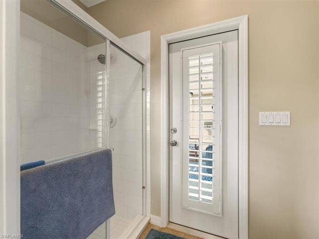 10000 Isola Way, Miromar Lakes, FL 33913 Primary Bath that is accessible to lanai