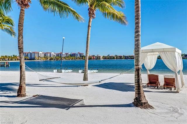 10000 Isola Way, Miromar Lakes, FL 33913 Beach area with cabanas