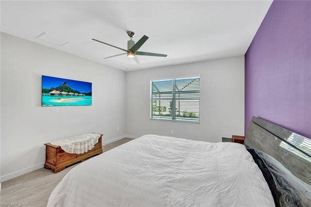 18298 Ridgeline Dr, Estero, FL 33928 Bedroom featuring a ceiling fan and baseboards