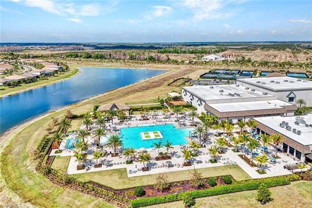 18298 Ridgeline Dr, Estero, FL 33928 Bird's eye view of a pool and a nearby body of water