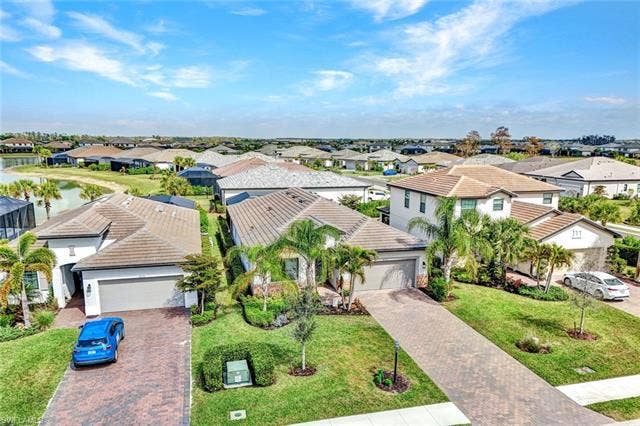 18298 Ridgeline Dr, Estero, FL 33928 Aerial perspective of suburban area