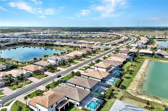 18298 Ridgeline Dr, Estero, FL 33928 Aerial view of residential area featuring a large body of water