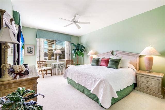 20667 Wildcat Run Dr, #101, Estero, FL 33928 Primary bedroom featuring a ceiling fan