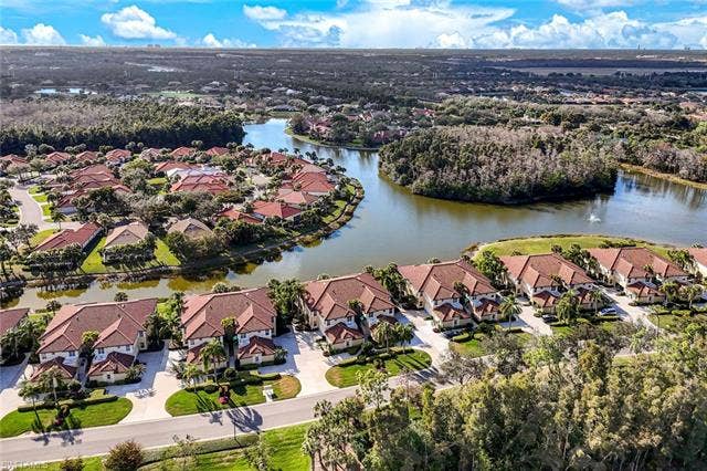 20667 Wildcat Run Dr, #101, Estero, FL 33928 Aerial view of residential area featuring a nearby body of water
