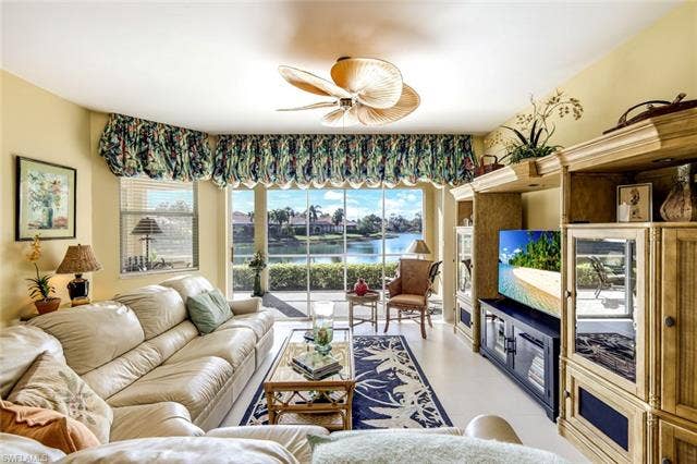 20667 Wildcat Run Dr, #101, Estero, FL 33928 Living area featuring a ceiling fan