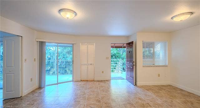 3160 Seasons Way, #709, Estero, FL 33928 Unfurnished room with baseboards and light tile patterned floors
