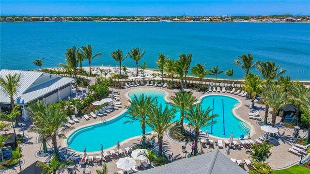 11861 Venetian Lagoon Dr, #203, Fort Myers, FL 33913 Community pool with a water view