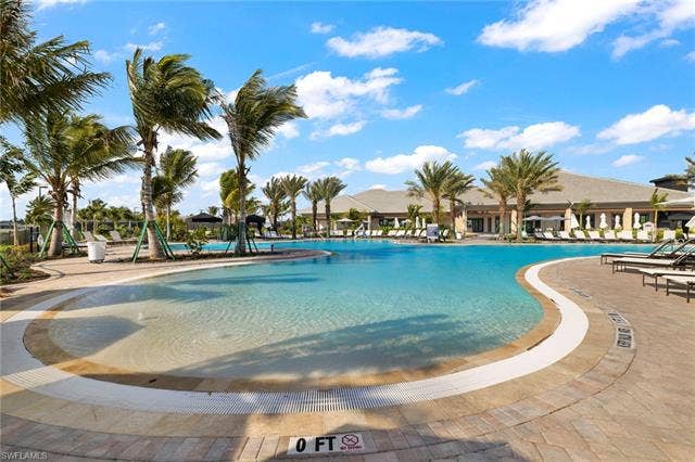 11861 Venetian Lagoon Dr, #203, Fort Myers, FL 33913 Community pool with a patio