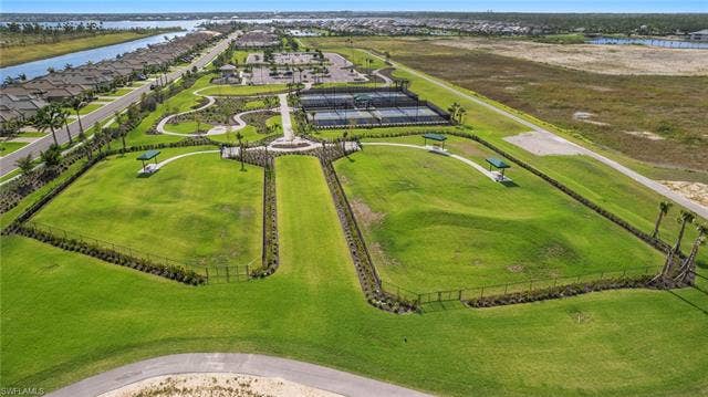11861 Venetian Lagoon Dr, #203, Fort Myers, FL 33913 Aerial view of residential area with a large body of water