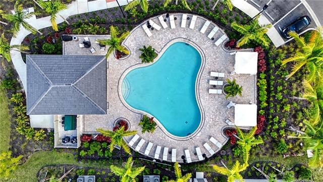11861 Venetian Lagoon Dr, #203, Fort Myers, FL 33913 Aerial view of a pool area
