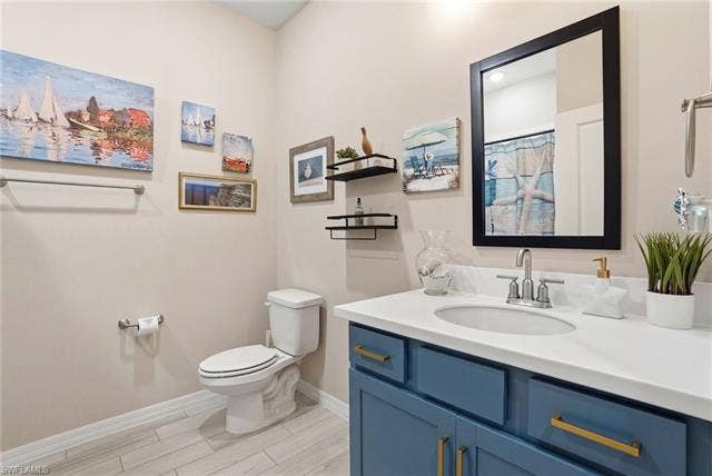 11861 Venetian Lagoon Dr, #203, Fort Myers, FL 33913 Bathroom with vanity and curtained shower