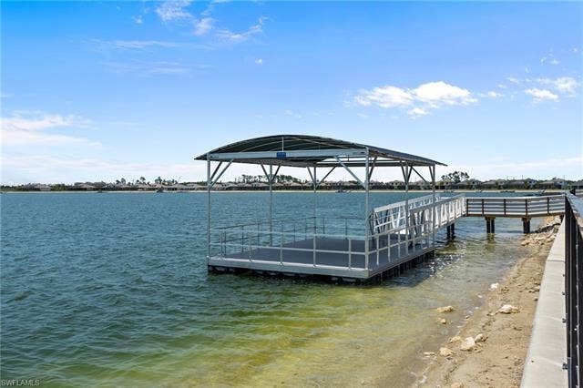 11861 Venetian Lagoon Dr, #203, Fort Myers, FL 33913 Dock area with a water view