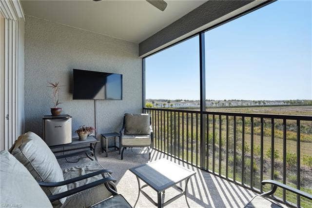 11861 Venetian Lagoon Dr, #203, Fort Myers, FL 33913 View of sunroom / solarium