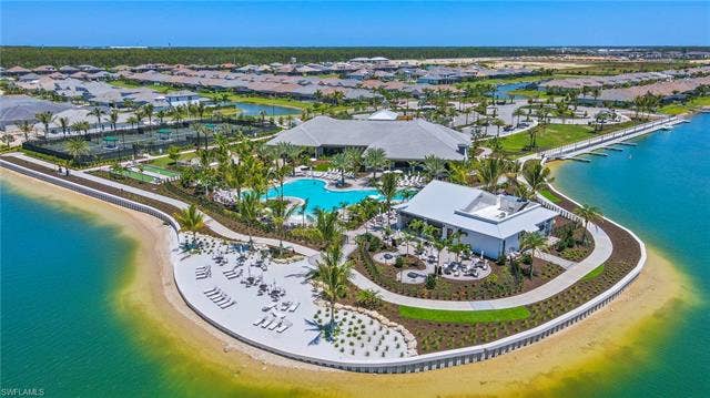 11861 Venetian Lagoon Dr, #203, Fort Myers, FL 33913 Aerial view of residential area featuring a large body of water