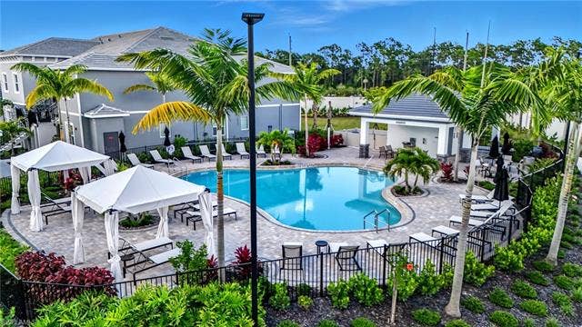 11861 Venetian Lagoon Dr, #203, Fort Myers, FL 33913 Community pool featuring a patio and a gazebo