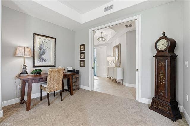 19620 Marino Lake Cir, #2802, Miromar Lakes, FL 33913 Home office with light colored carpet and baseboards