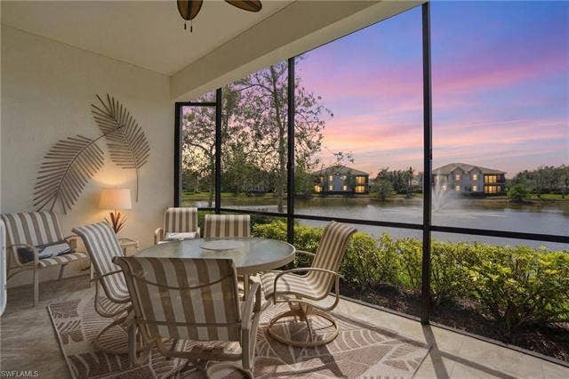 19620 Marino Lake Cir, #2802, Miromar Lakes, FL 33913 Sunroom featuring a water view