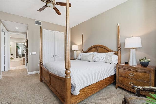19620 Marino Lake Cir, #2802, Miromar Lakes, FL 33913 Bedroom featuring carpet, ceiling fan, and a closet