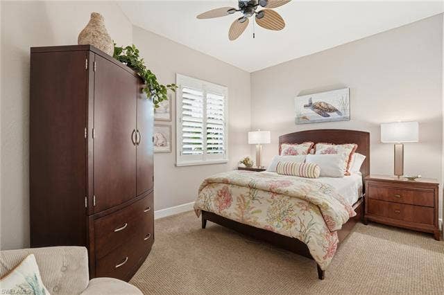 19620 Marino Lake Cir, #2802, Miromar Lakes, FL 33913 Bedroom featuring light colored carpet and ceiling fan