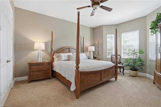 19620 Marino Lake Cir, #2802, Miromar Lakes, FL 33913 Bedroom with light carpet and ceiling fan