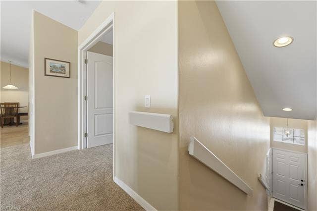23541 Sandycreek Ter, #806, Estero, FL 34135 Hall featuring recessed lighting, light carpet, and an upstairs landing