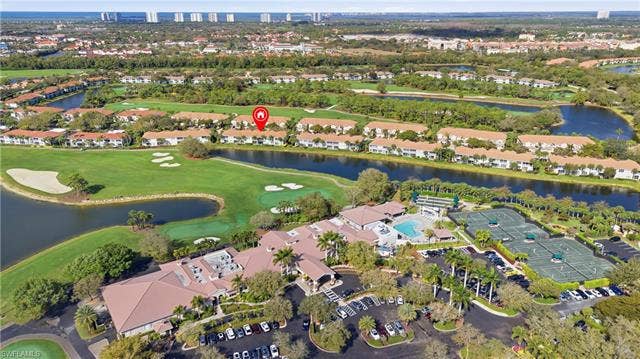 23541 Sandycreek Ter, #806, Estero, FL 34135 Aerial overview of property's location with a nearby body of water and a golf club