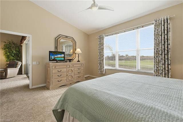 23541 Sandycreek Ter, #806, Estero, FL 34135 Bedroom with lofted ceiling, light colored carpet, and ceiling fan