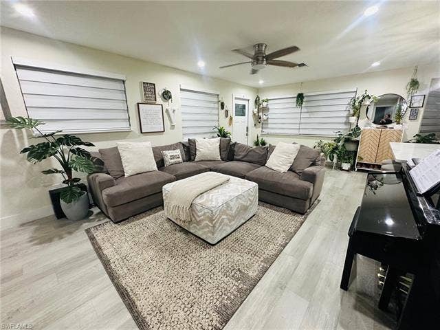 3323 Guilford Ct, Naples, FL 34112 Large den/family room offers many options