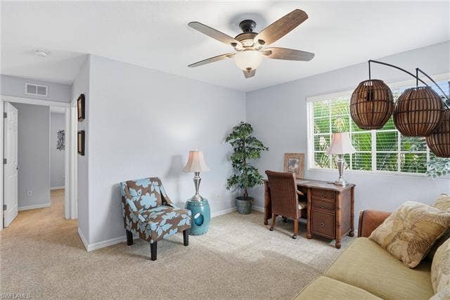 17801 Modena Rd, Miromar Lakes, FL 33913 Office area featuring light carpet and a ceiling fan