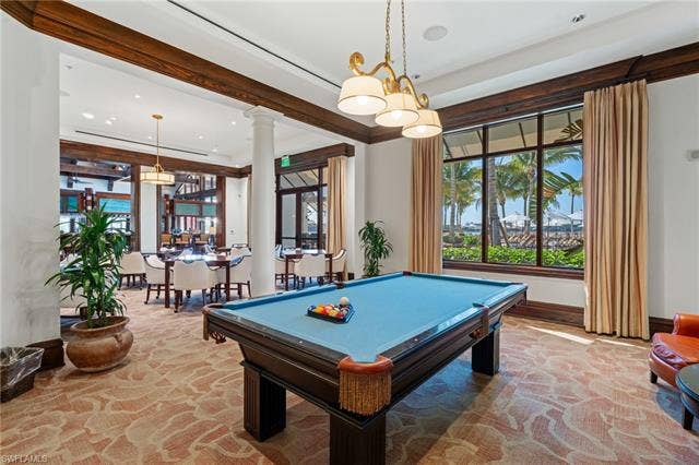 17801 Modena Rd, Miromar Lakes, FL 33913 Recreation room with pool table, recessed lighting, and plenty of natural light