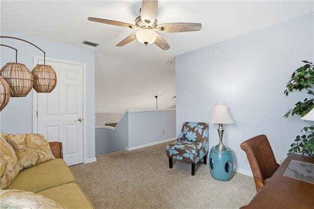 17801 Modena Rd, Miromar Lakes, FL 33913 Office space with ceiling fan and carpet