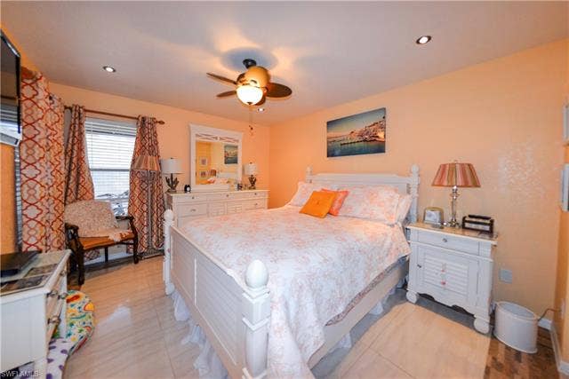 22161 Tallwood Ct, #706, Estero, FL 33928 Bedroom featuring recessed lighting, a ceiling fan, and tiled flooring