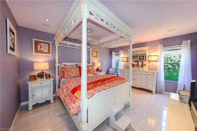 22161 Tallwood Ct, #706, Estero, FL 33928 Recessed ceiling lighting, a ceiling fan, and light-tone tile flooring
