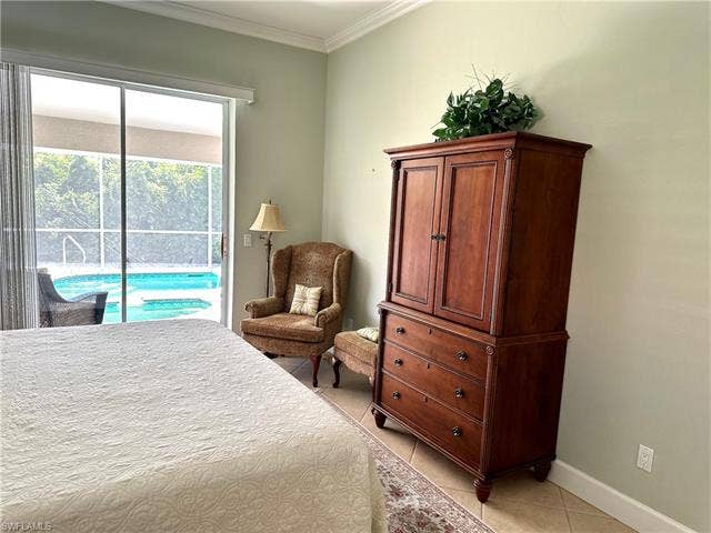 12654 Buttonbush Pl, Bonita Springs, FL 34135 The main bedroom has an en suite, 2 closets, plus a linen closet. Just outside the sliders is a lovely sitting area.