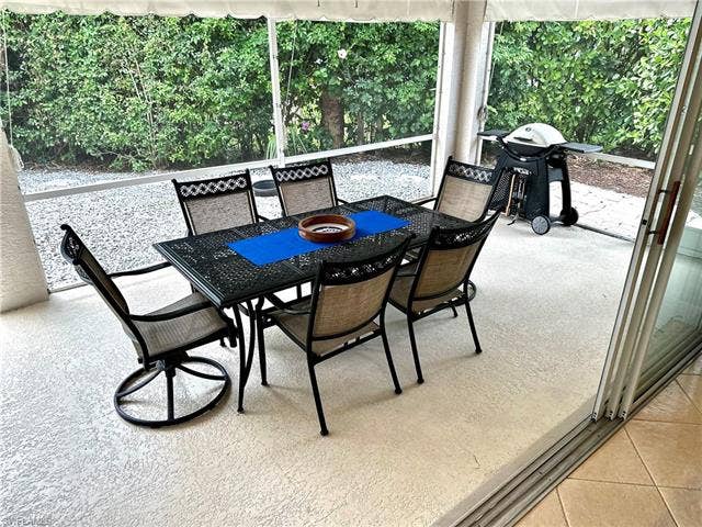 12654 Buttonbush Pl, Bonita Springs, FL 34135 The patio has plenty of room for dining and cooking outdoors.