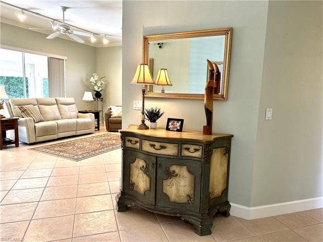 12654 Buttonbush Pl, Bonita Springs, FL 34135 There is a nice flow from the foyer in the living room.