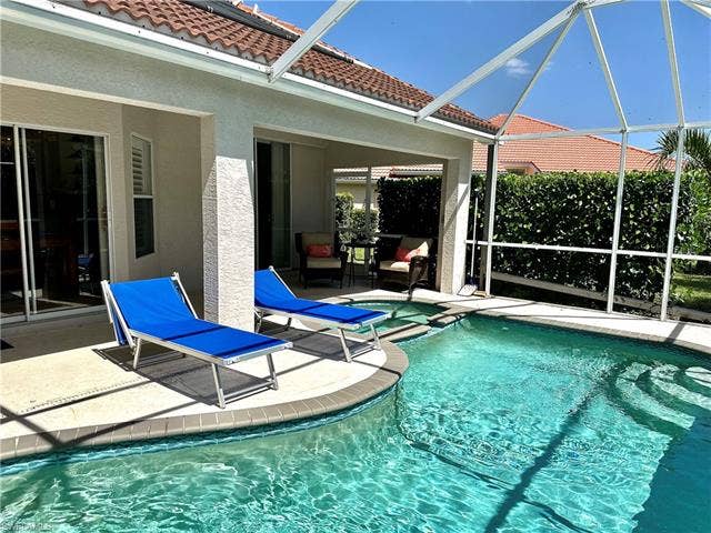 12654 Buttonbush Pl, Bonita Springs, FL 34135 The screened patio/pool area provides both sunny and shaded areas to enjoy.