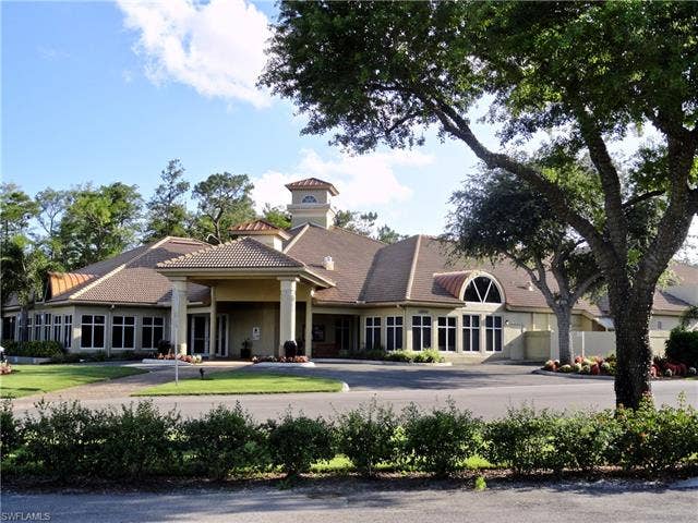 12654 Buttonbush Pl, Bonita Springs, FL 34135 Clubhouse with pro shop and dining facilities.