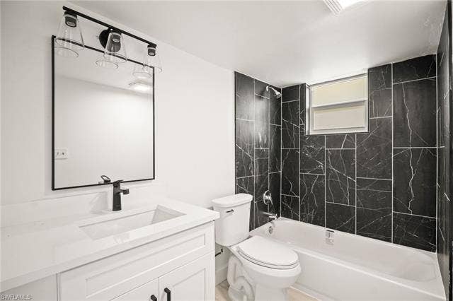 2316 Bayside St, Naples, FL 34112 Bathroom with shower / bathtub combination and vanity