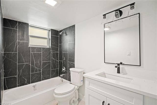 2316 Bayside St, Naples, FL 34112 Bathroom with vanity and shower / tub combination