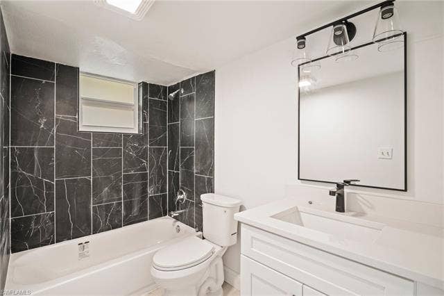 2316 Bayside St, Naples, FL 34112 Full bath with vanity and shower / bath combination