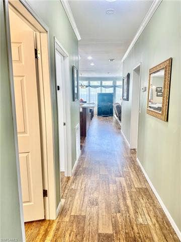 20472 Luettich Ln, Estero, FL 33928 Hallway from Primary bedroom to kitchen