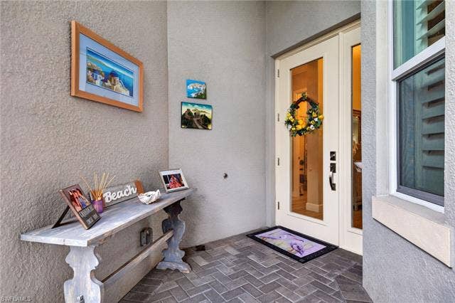 16459 Orinda Way, Bonita Springs, FL 34135 Glass inserts in door let lots of light in!