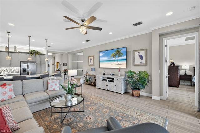 16459 Orinda Way, Bonita Springs, FL 34135 3rd view of great room w/ sneak peak of custom wall in formal dining room!