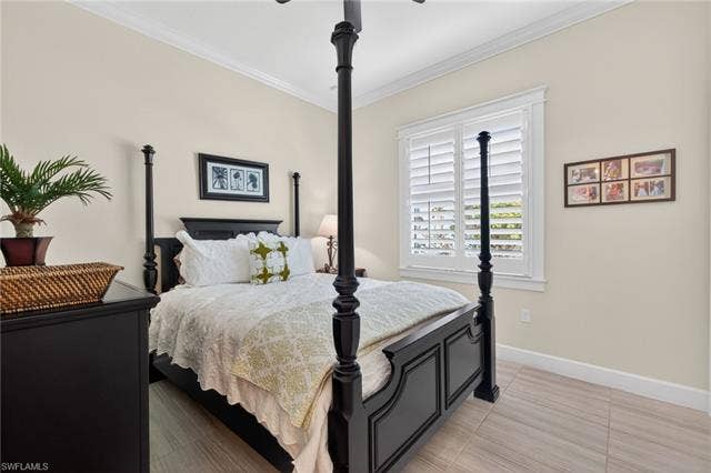 16459 Orinda Way, Bonita Springs, FL 34135 2nd bedroom features a walk-in closet, plantation shutter and plank tile flooring.