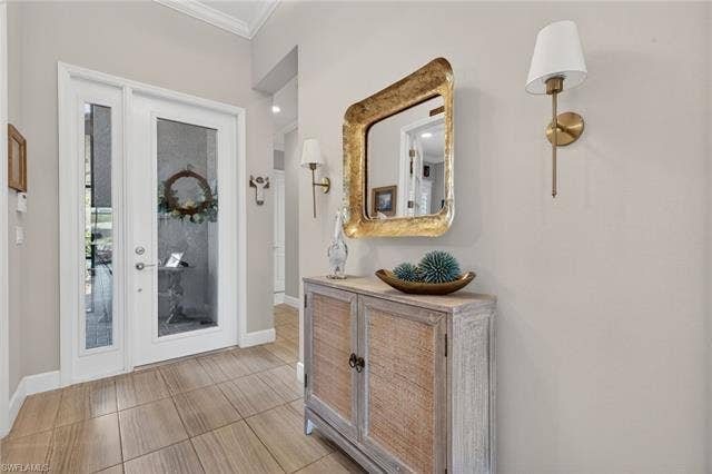 16459 Orinda Way, Bonita Springs, FL 34135 WELCOME to your new home! Spacious foyer and 1st look at gorgeous plank tile flooring!